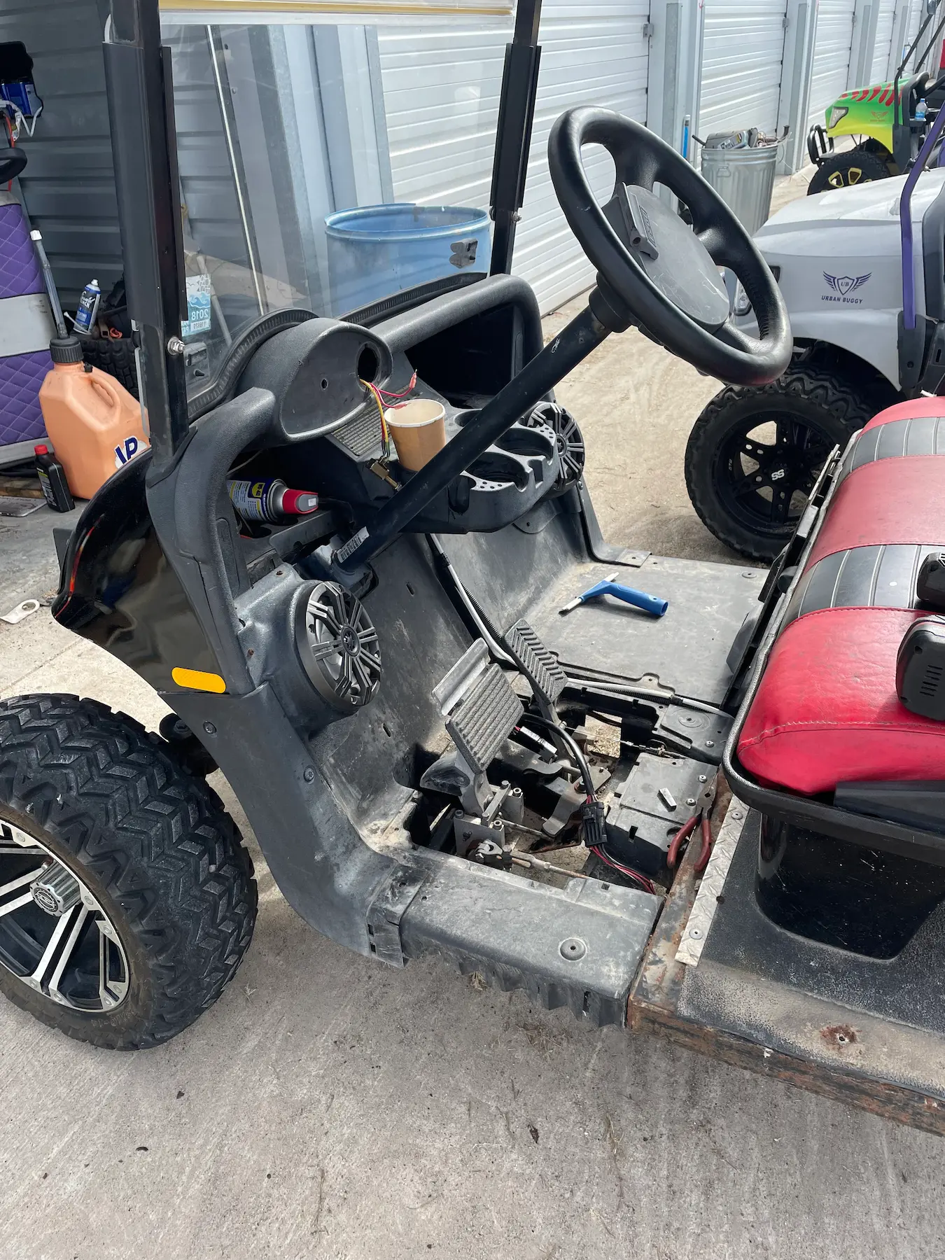 Foot pedal installation on golf cart